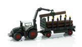 Fendt 939 tractor with wood trailer