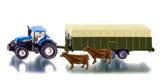 Tractor New Holland T7070 with Fortuna twin axle stock trailer