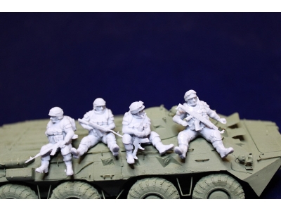 4 Ukrainian Soldiers Sitting On A Vehicle - zdjęcie 1